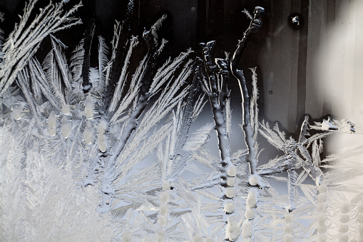 frost and crystals of ice on a window