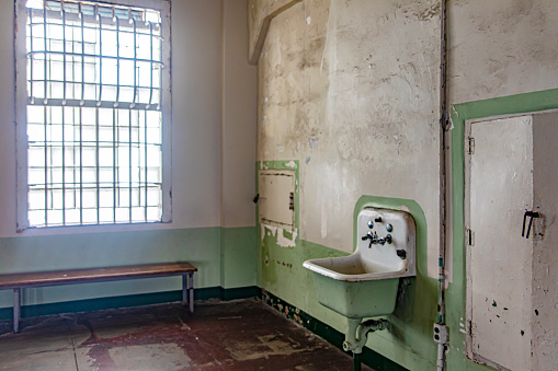 Sink in the bathroom of the maximum security federal prison Alcatraz, located on an island in the middle of San Francisco Bay, California, USA. American concept.