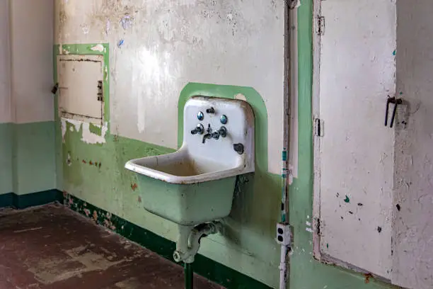Photo of Old toilet of the maximum security federal prison of Alcatraz, located on an island in the middle of the bay of San Francisco, California, USA.