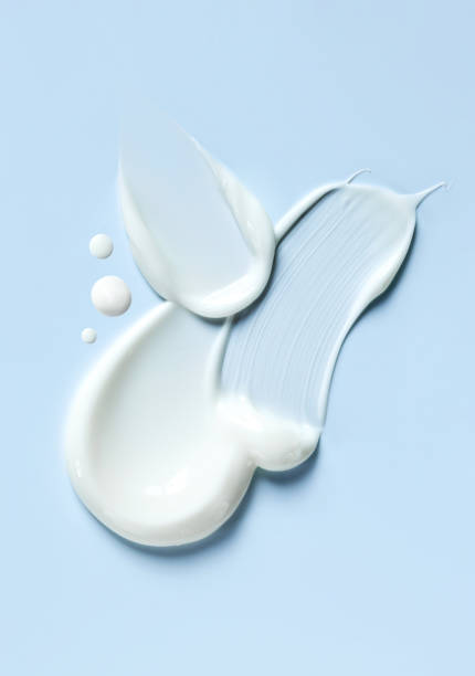 istock cosmetic smears cream texture on blue background 1498880278