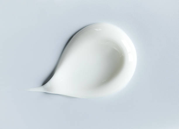 istock cosmetic smears of creamy texture on gray background 1498880954