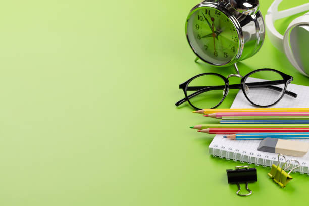 istock School supplies and stationery on green 1498881390