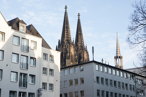 Cologne Cathedral in contrast with modern buildings in the foreground