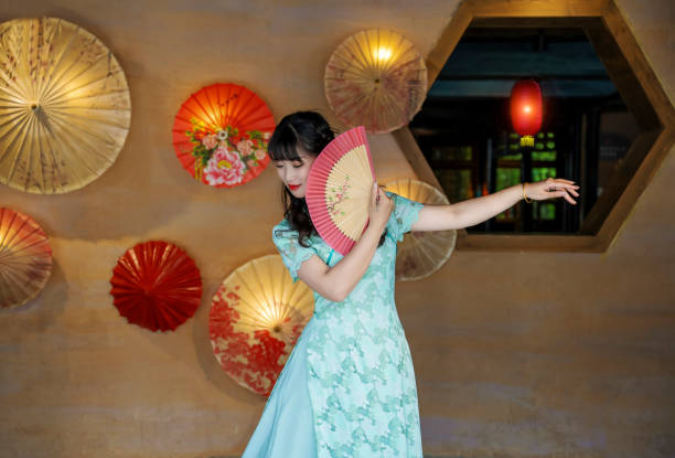 Portrait of a woman wearing a cheongsam, a traditional Chinese costume