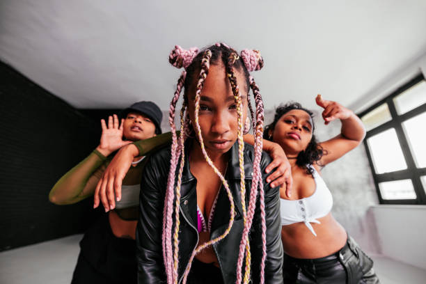 istock African American dancer with friends in studio. 1498885683