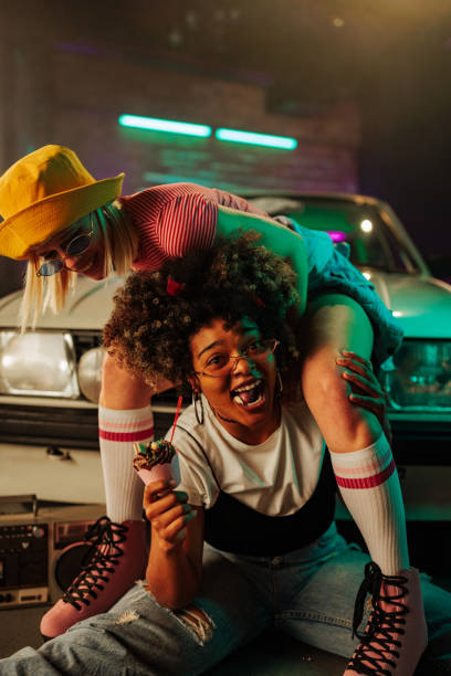 istock Cheerful girls hanging out outside 1498887216