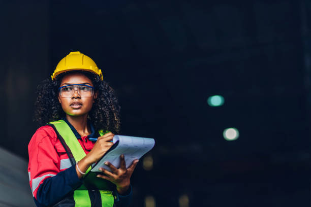 istock Workers Factory or Engineering work at factory site check up machine or products in site. Foreman or Technician checking Material or Machine on Plant. Heavy industry factory concept. 1498888167