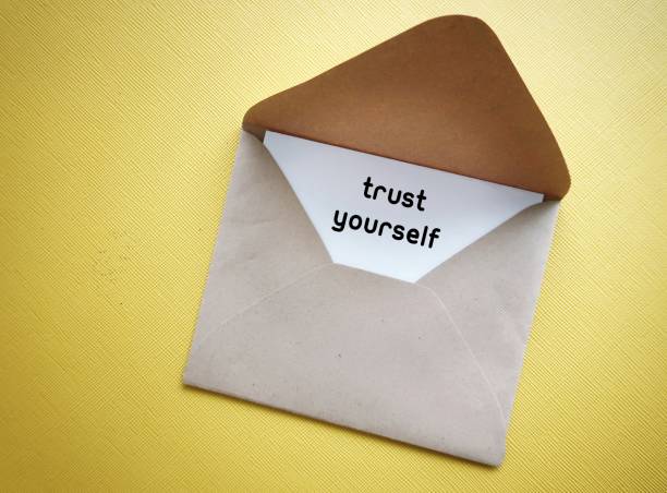 istock Crd in envelope with text written TRUST YOURSELF, positive affirmation to build self-trust, being compassionate toward yourself, listen to inner voice and stop second-guessing yourself 1498889043