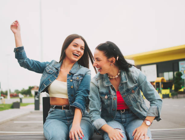 istock Two beautiful women having fun 1498889750