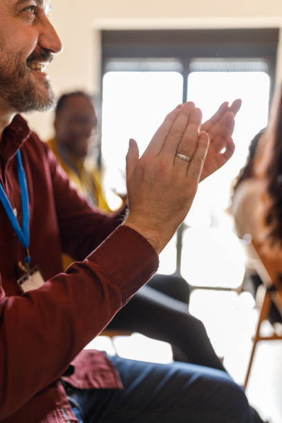 istock Business people applauding after a successful presentation or a seminar 1498890837