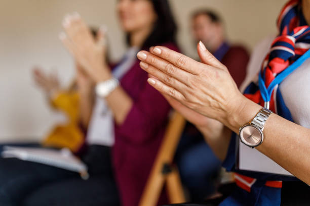 istock Business people applauding after a successful presentation or a seminar 1498890973