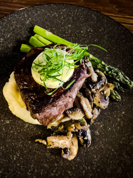 istock Eye Fillet Steak with Truffle Butter and Vegetables 1498894991