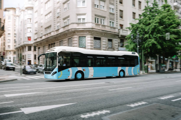 istock Bus in motion in a city 1498898284