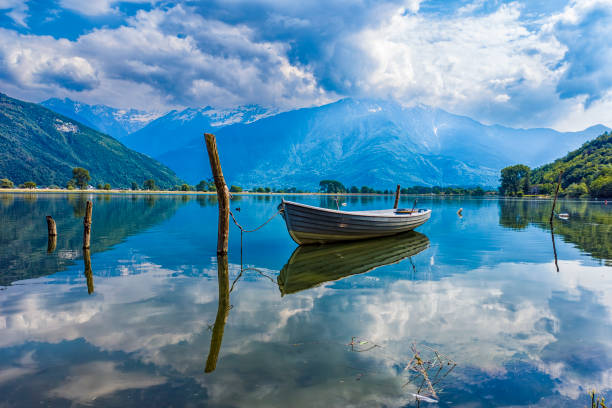 Boat moored on Mera river in Valchiavenna