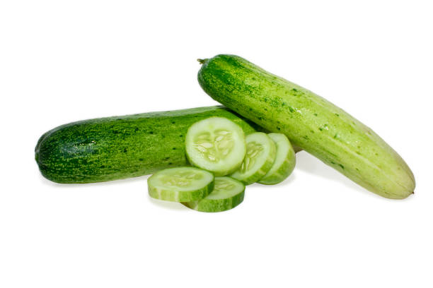istock Cucumber and slices isolated on white background. 1498900028