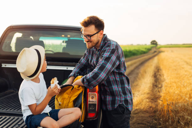 istock father and son outdoor at field 1498903482