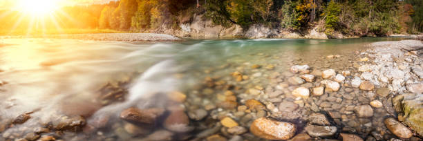 Free Stock Photo of The Sun Shines Brightly Over a River in a Canyon ...