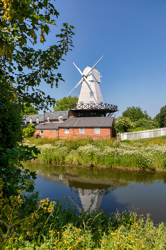 Windmill Rhaude - June, 13th, 2019. The gallery Dutch windmill Rhaude was built in 1852 and is located in Rhauderfehn near the town of Leer along the Lower Saxon Mill Road in East Friesland, Germany.