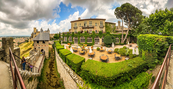 A panoramic view of the Hotel de la Cite, located within the walls of the castle and medieval city of Carcassonne, France.