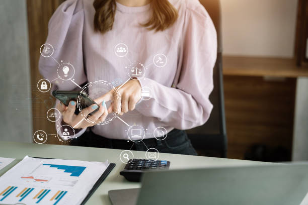 istock Copyright or patent concept, Person hand using laptop computer, tablet and smartphone with virtual screen copyright icon trademark, Creation ownership against piracy at office. 1498907519