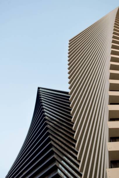 istock Low-angle shot of modern axis towers against a blue sky 1498914918
