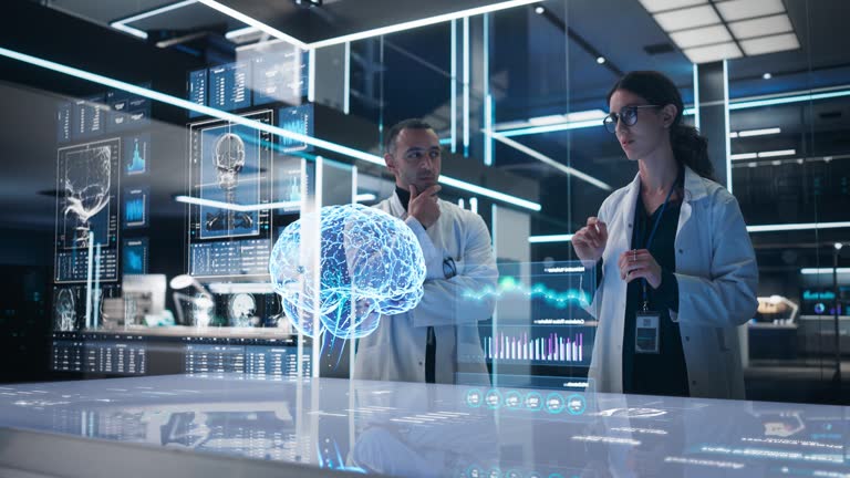 Two Neuroscientists Working With Computer-Powered Animated VFX Hologram Of Human Brain And Nervous System In Futuristic Laboratory. Multiethnic Man And Woman Working On Solutions for Brain Tumor.