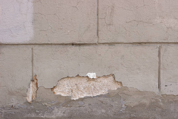 istock old grungy gray blue red yellow texture concrete stone wall background 1498922735