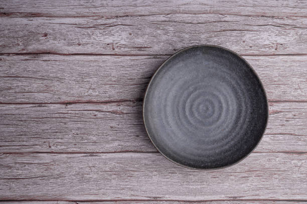 istock Top view of a plate on an old wooden table 1498925679