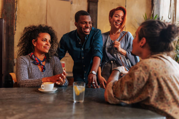 istock Multiracial couples meeting at restaurant. 1498930309