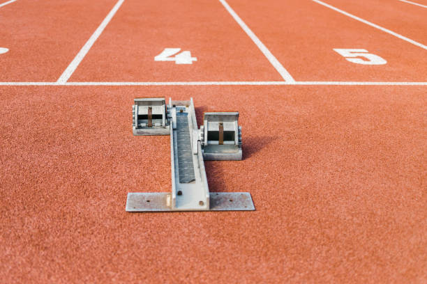istock Running track with a starting block in start line number four, close up 1498937788