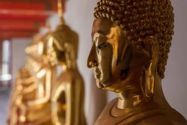 Photo of Buddha statues at Wat Po (Wat Pho), Temple of Reclining Buddha popular tourist attraction in Bangkok , Thailand