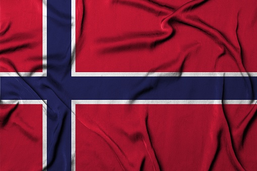 A digital render of a Norweigan flag on a wrinkled fabric material