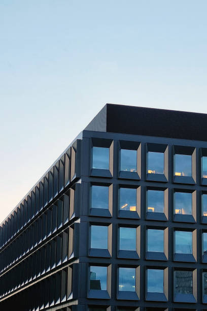 istock Beautiful architecture of a modern building against the sky. 1498942563