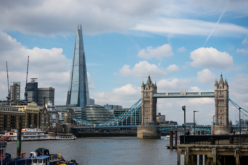 London's tower bridge skyline shot in May 2021. The city continues to slowly return to normal as restrictions ease further due to the lockdown caused by the COVID-19 Pandemic. The streets and transport system still are seeing a considerably reduced level of footfall.