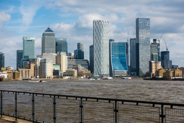 Canary Wharf buildings and skyline viewed from the North Thames Path, London