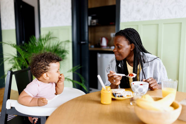 istock Joyful baby having fun with his mother 1498947488
