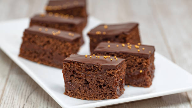 Chocolate brownies on wooden table, homemade bakery and dessert stock photo