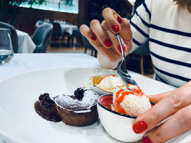 istock Chocolate souffle with ice cream, on a white plate. ready to eat. 1498962637