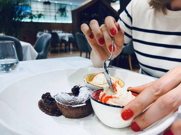 istock Chocolate souffle with ice cream, on a white plate. ready to eat. 1498962693