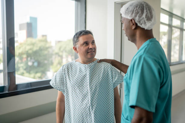 istock Surgeon doctor talking to patient 1498969639