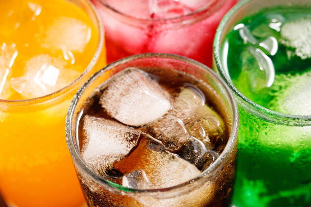 istock Soft drinks and fruit juice mixed with soda high in sugar have a negative effect on physical health 1498971393