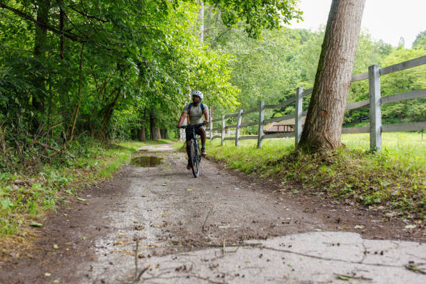 woman riding moutain bike in the forest