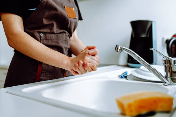 istock Dishwasher in kitchen near kitchen sink 1498977061