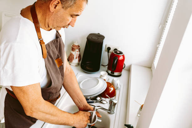 istock Dishwasher in kitchen near kitchen sink 1498979269