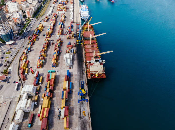 istock Cargo ship dock - aerial view of dockyard 1498980346