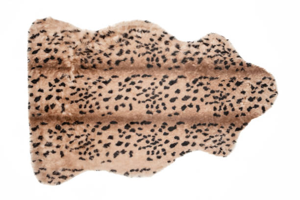istock Beige leopard fur carpet on a white background 1498981708