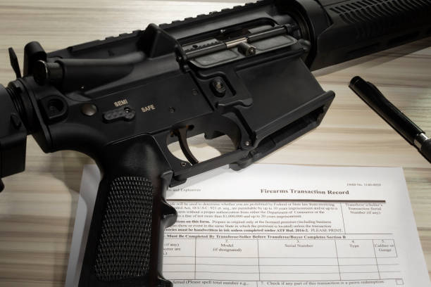 istock Assault rifle with public domain purchase form 1498983954
