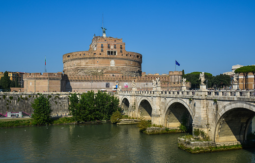 Rome, Italy - Oct 14, 2018. Castel Sant Angelo with Tiber River. The building was later used by the Popes as a fortress and castle, and is now a museum.