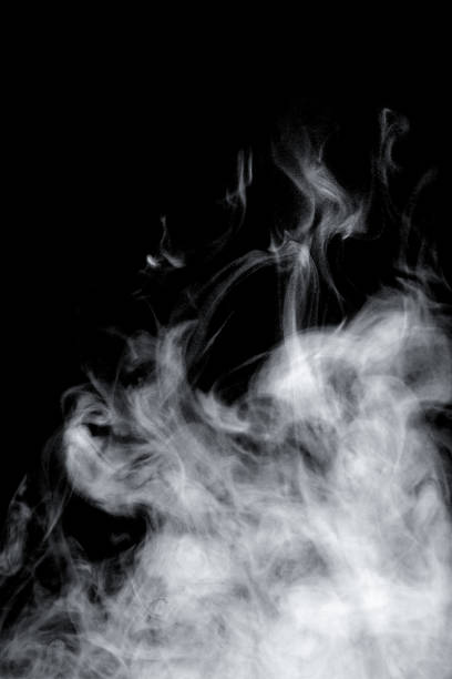 istock isolated smoke, abstract powder, water spray on black background. 1498988957