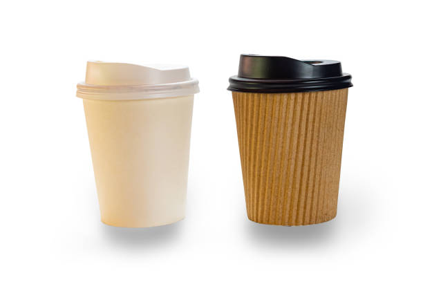 istock Side view of two empty paper coffee cups. 1498990596